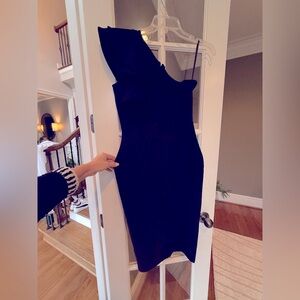 NWT beautiful black one shoulder dress. Size Medium. Great fit, comfortable.